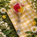 Pressed flower badge reel